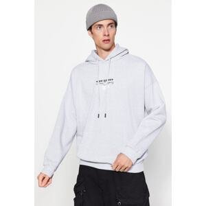 Trendyol Gray Melange Oversize/Wide-Cut Hoodie with Fleece Inner Space Back Print Sweatshirt.